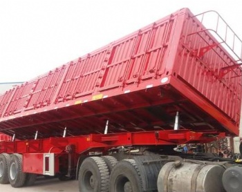 Dumping semi-trailer truck