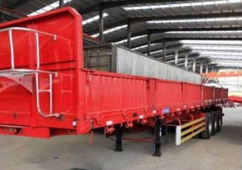 Dumping semi-trailer truck